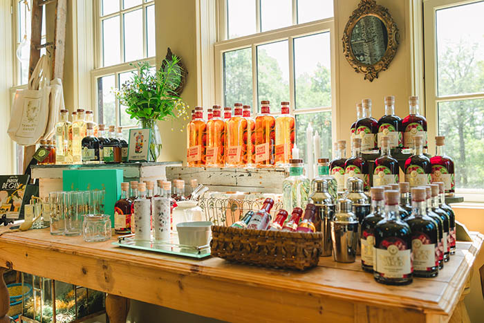 local spirits for sale arranged on a table at a distillery