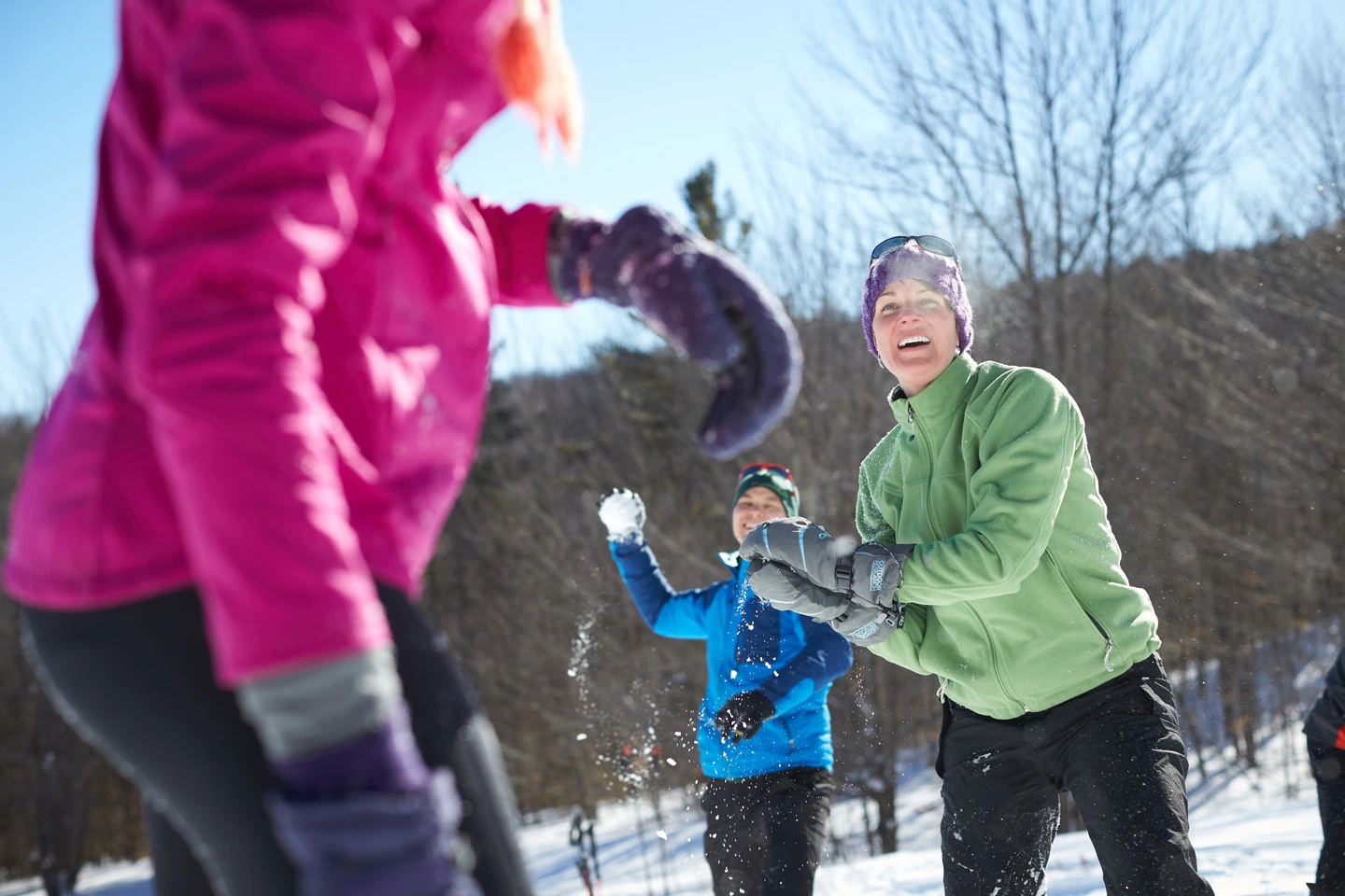 People having a snowball fight